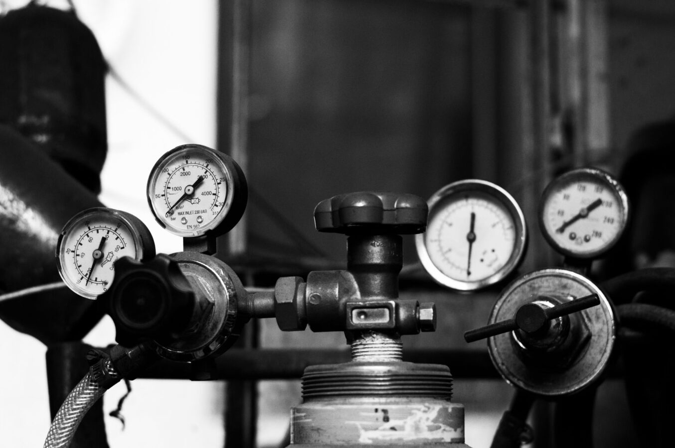 mechanic testing diesel injection pump pressure gauge
