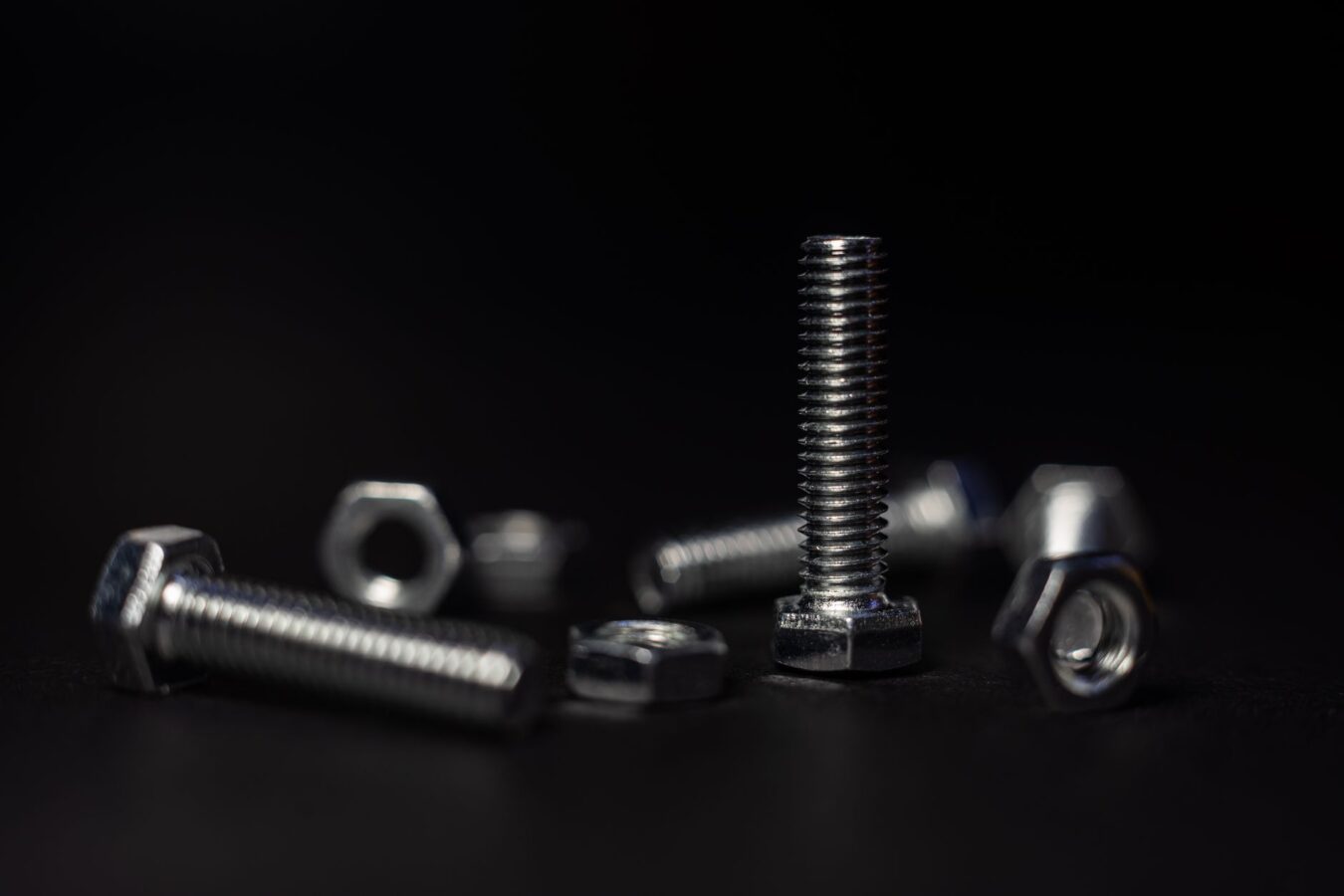 exploded view of timing cover assembly showing seals and bolts