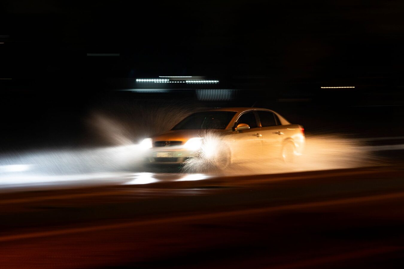 Comparison of halogen, LED and laser headlight beams on road