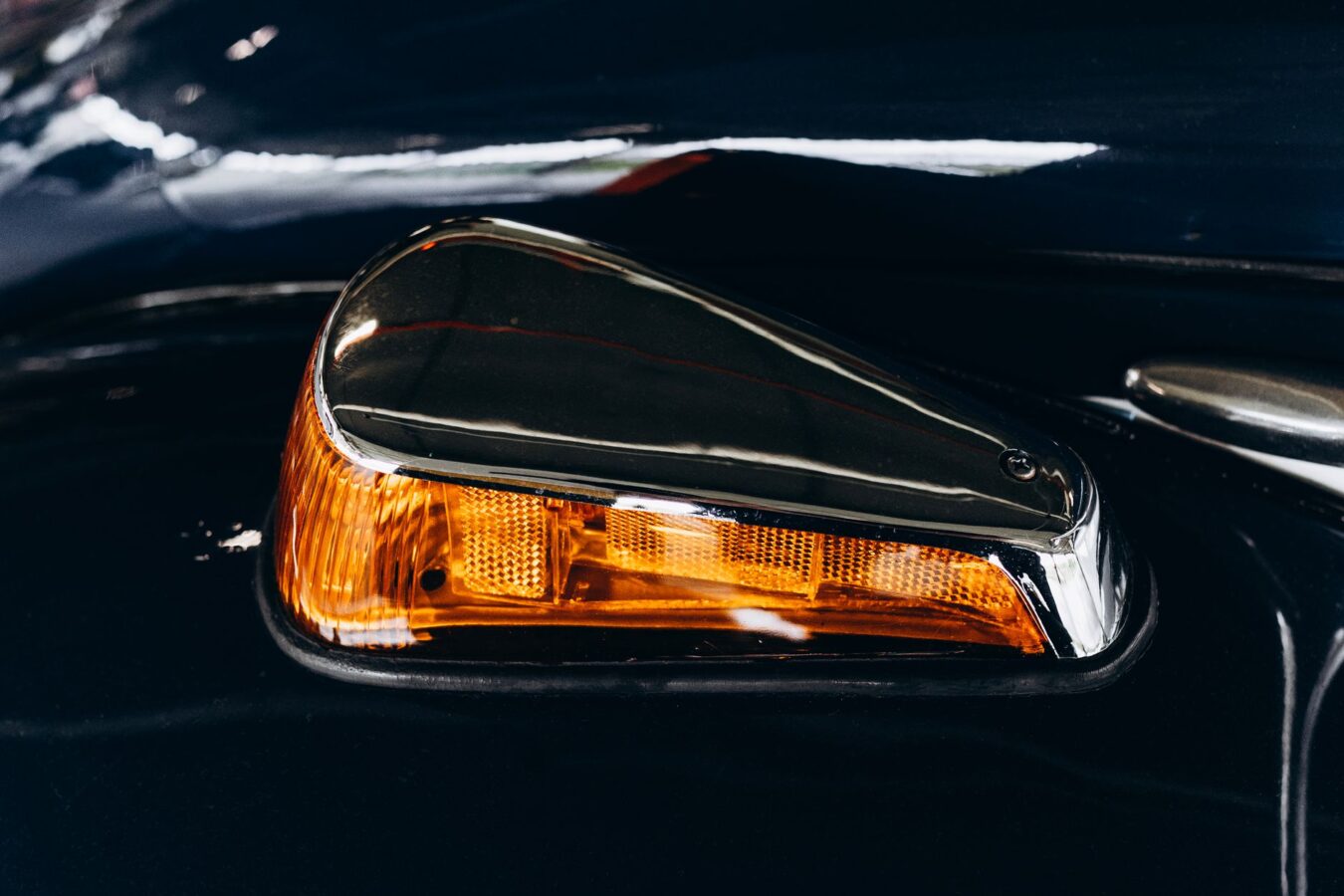 modern car mirror with turn signal LED detail