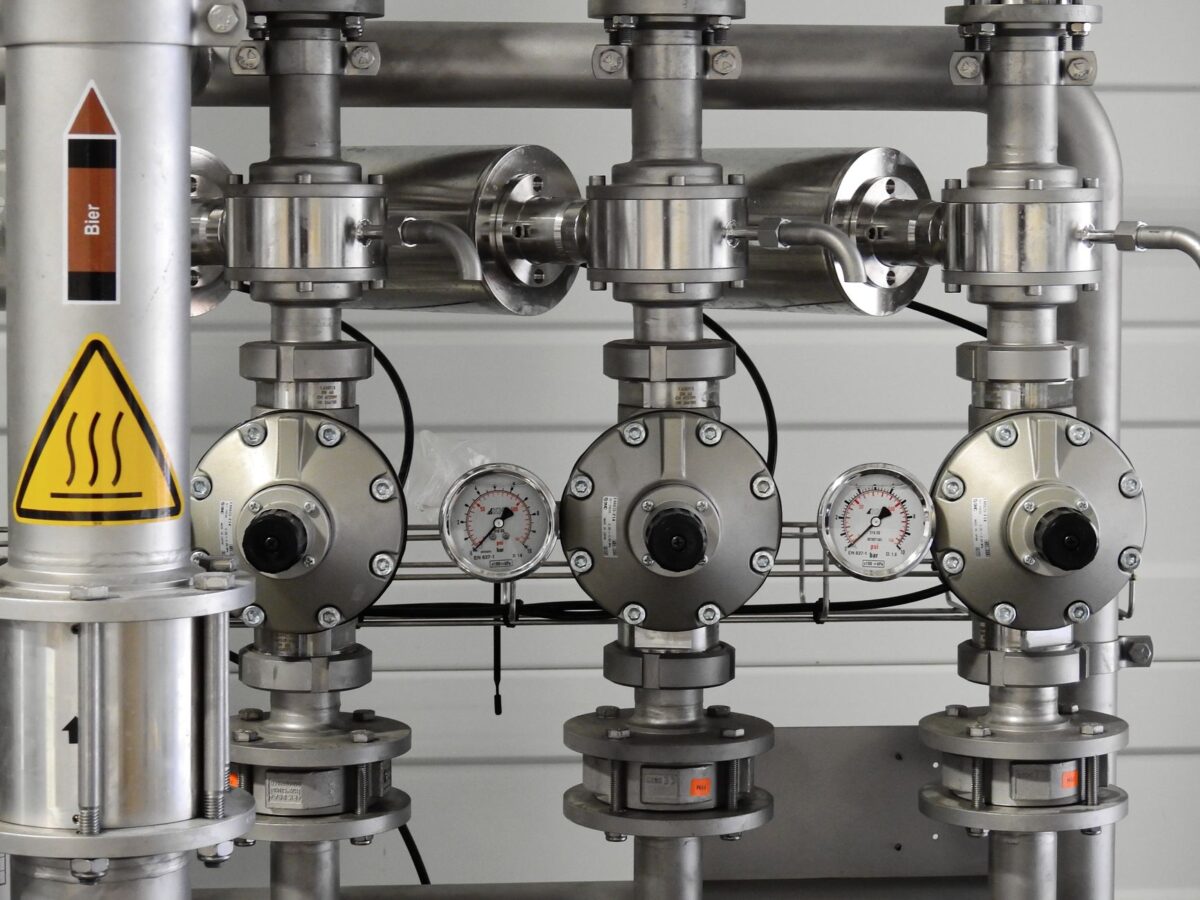 cooling system pressure testing equipment connected to car radiator