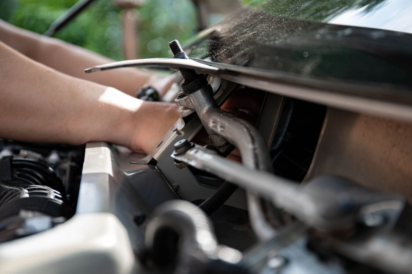 car hood hinge mechanism close up