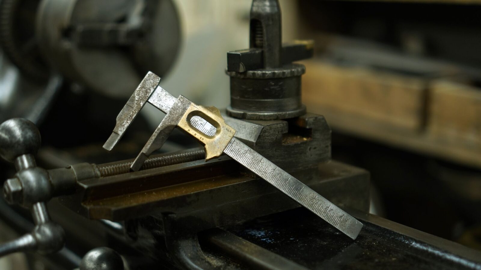 mechanic measuring bearing clearance with plastigage