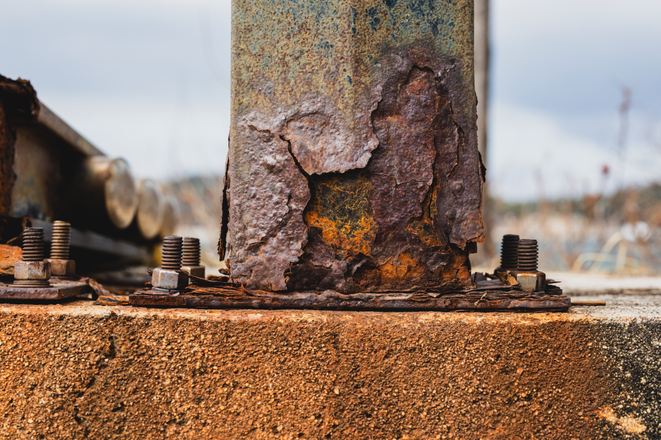 seized bolt with copper grease residue hardened and cracked texture