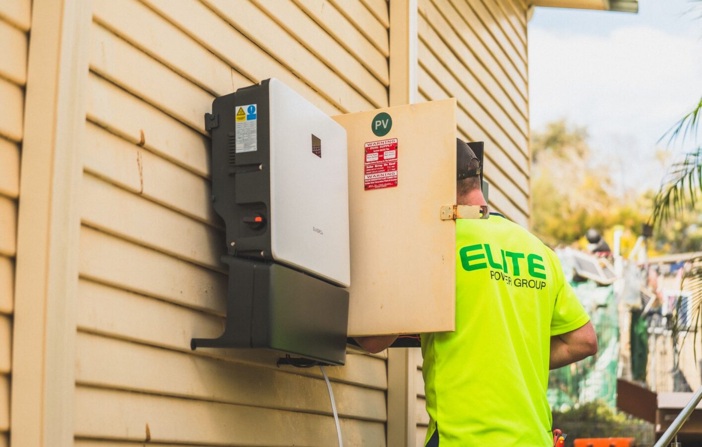 electrician installing home charging station
