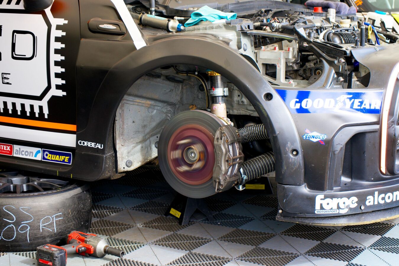 worn brake pads comparison with new ones showing thickness difference